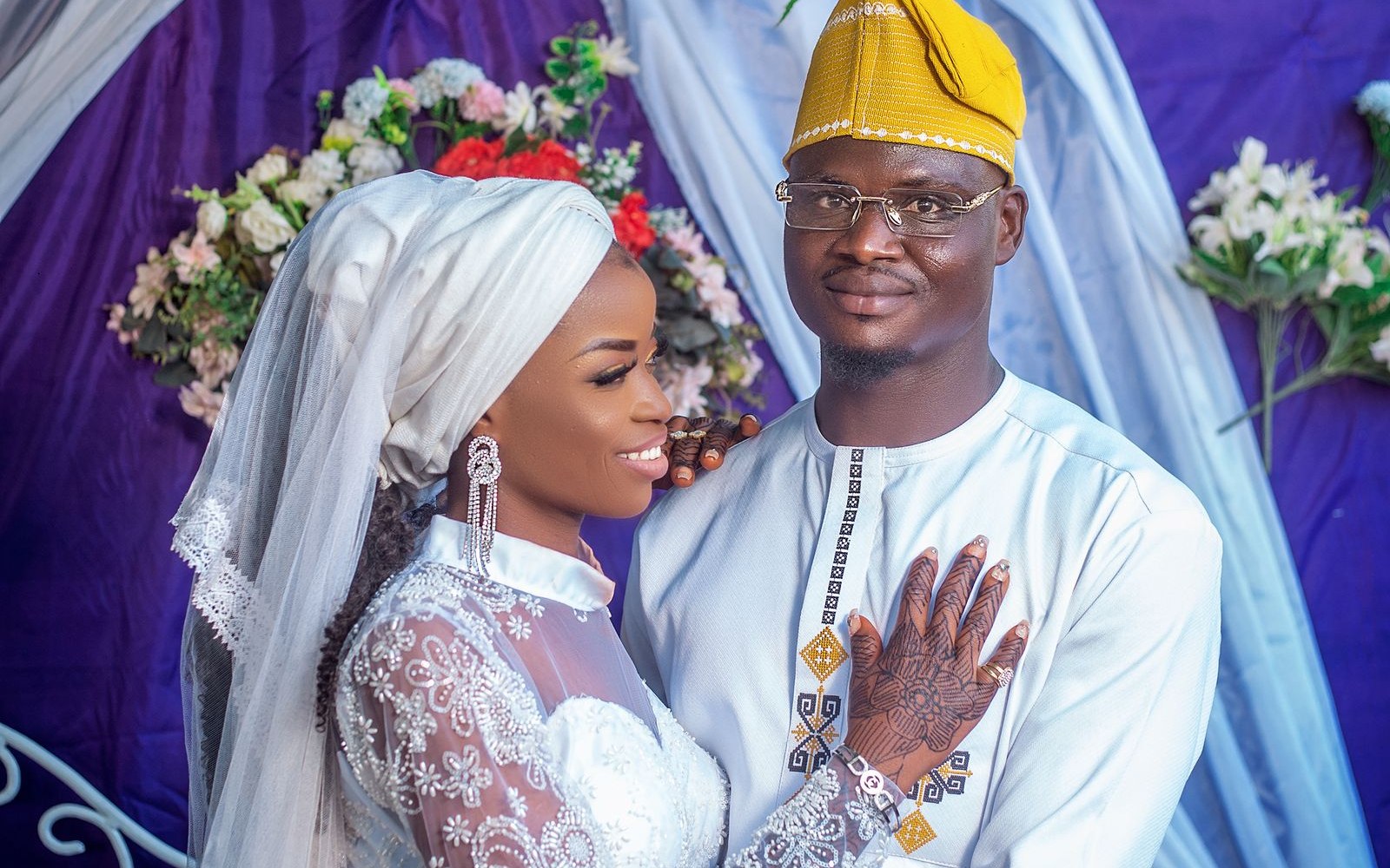 A Nigerian couple in traditional wedding attire